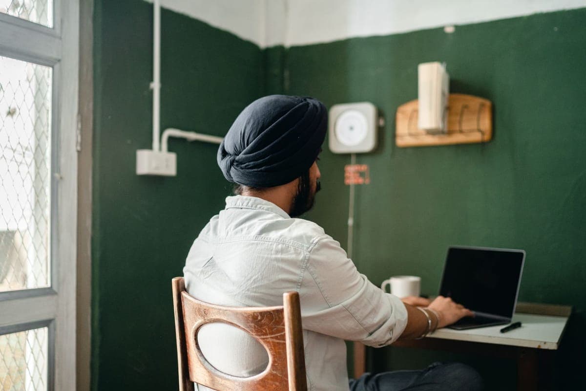 A developer in India working on a laptop from home